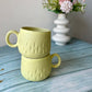 Yellow tea cup