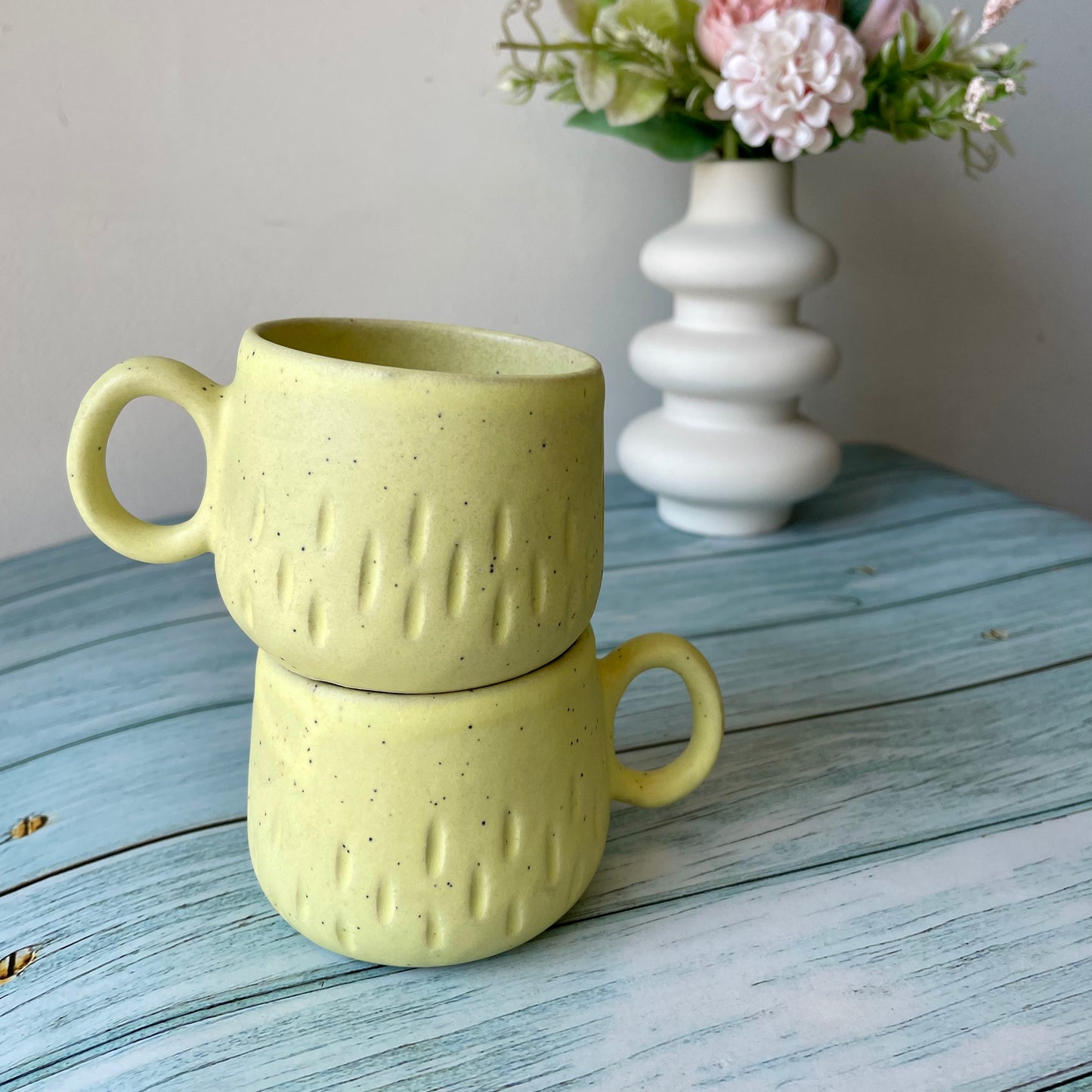 Yellow tea cup