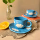 In the clouds mug saucer set