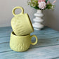 Yellow tea cup