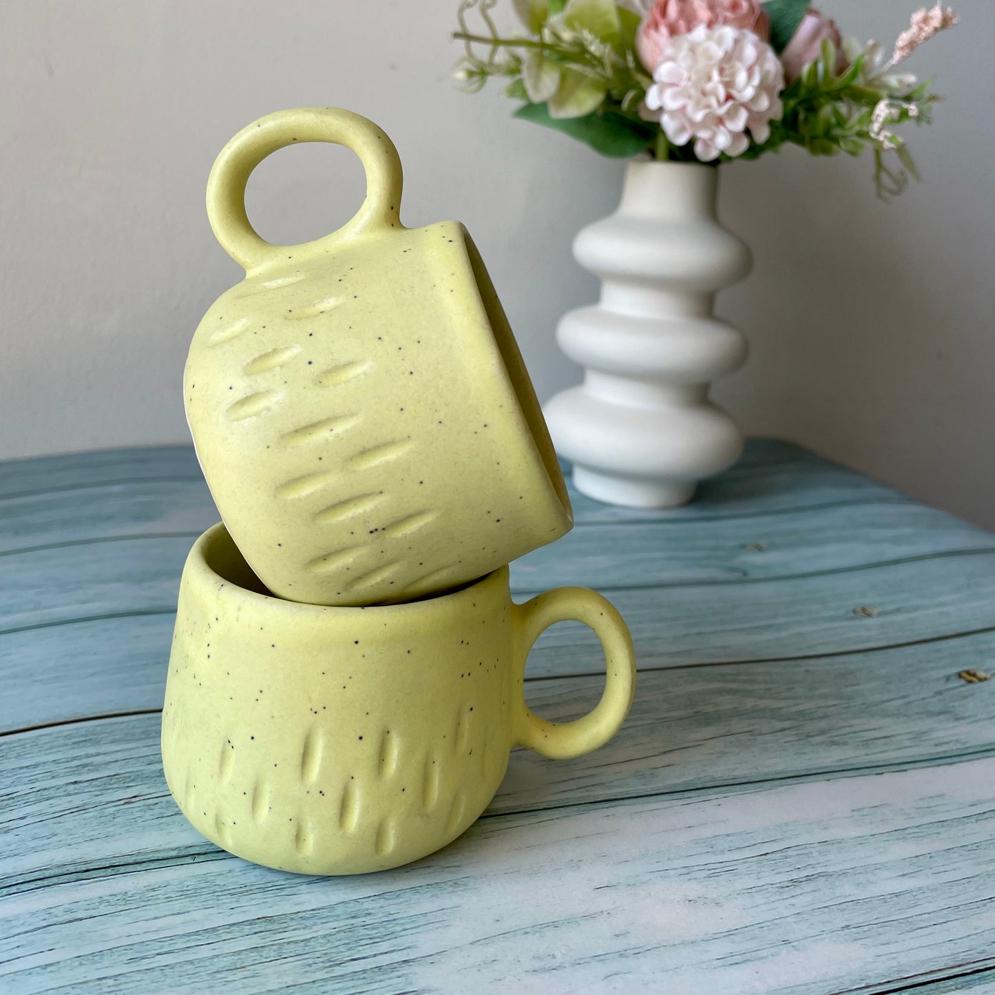 Yellow tea cup