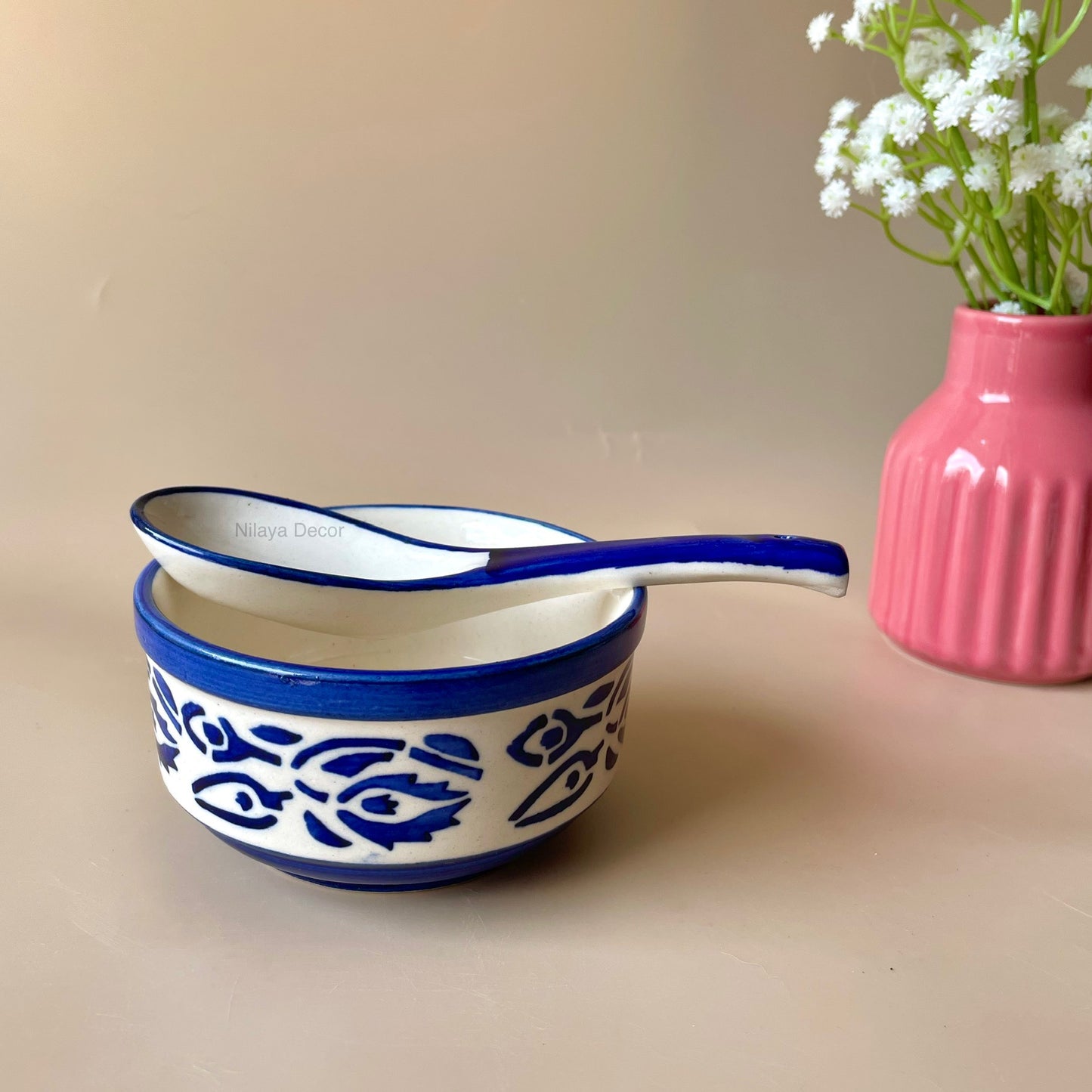 Blue leaf soup bowl with spoon
