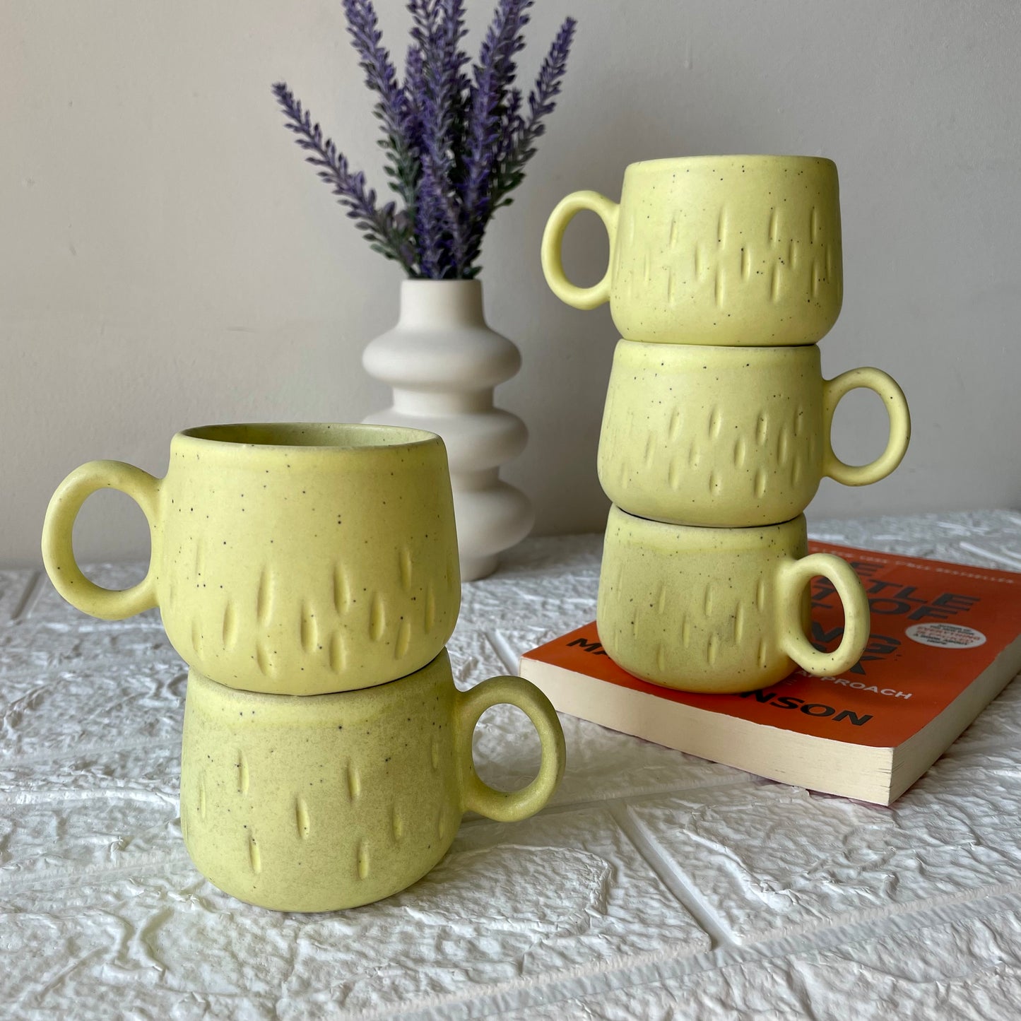 Yellow tea cup