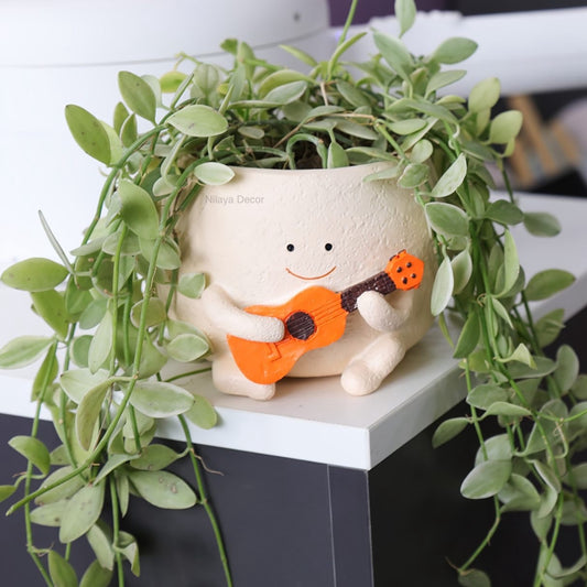 Guitar buddy planter
