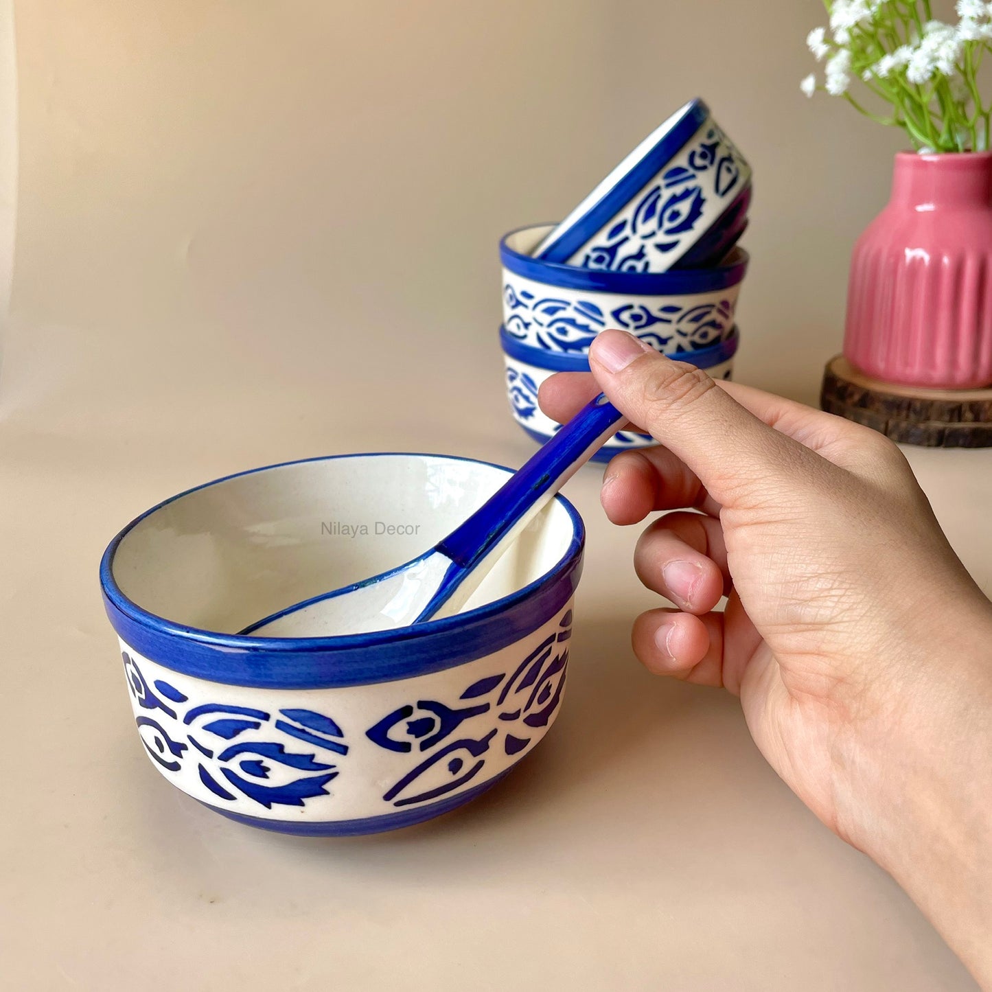 Blue leaf soup bowl with spoon