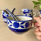 Blue floral soup cup with spoon